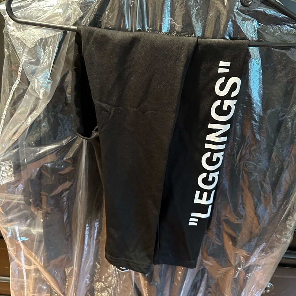 Never worn. Too small